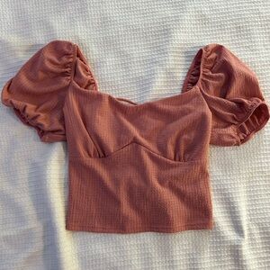 Pink top; scrunched sleeves